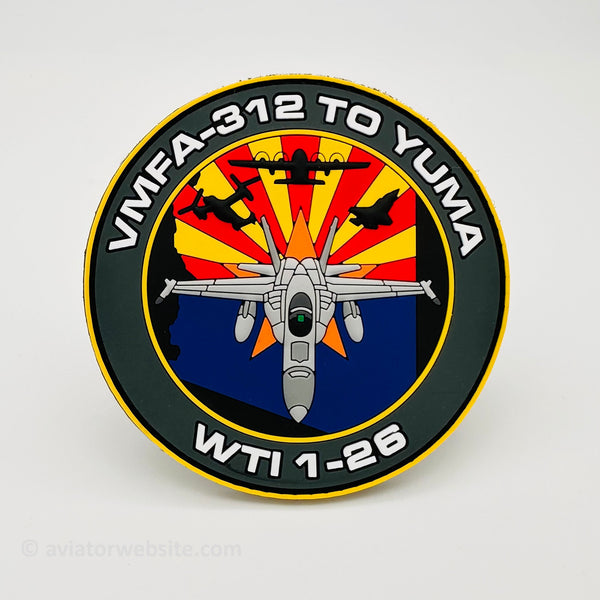 Circular patch with military aircraft design and text on a white background